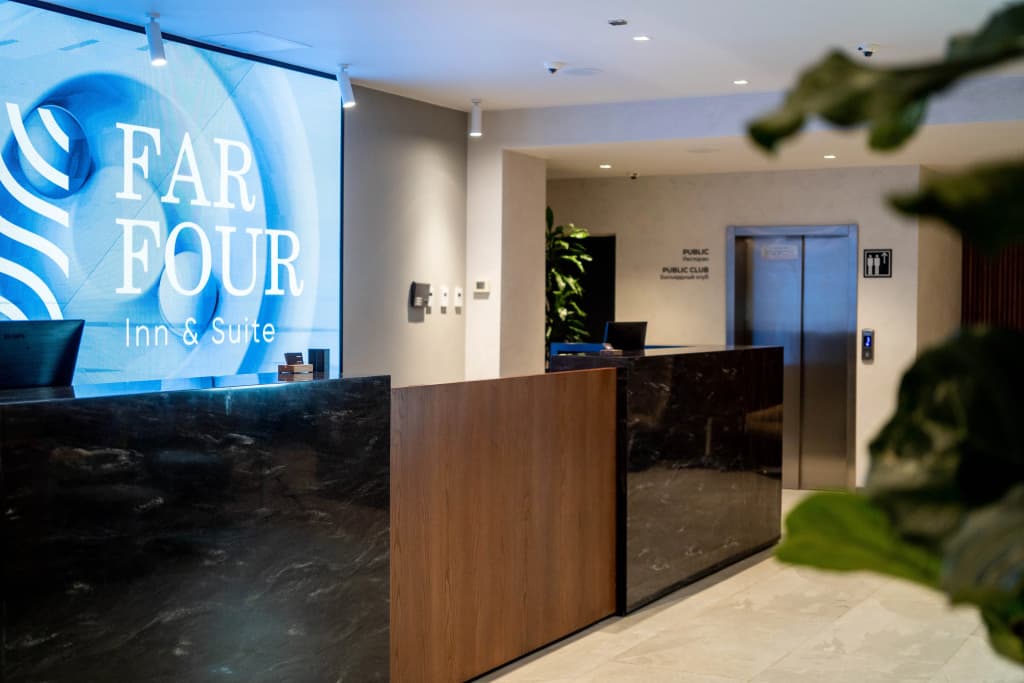 FarFour Inn & Suite Hotel